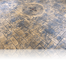 Random Ashlar Patio with Compass Feature in Rustic Sandstone